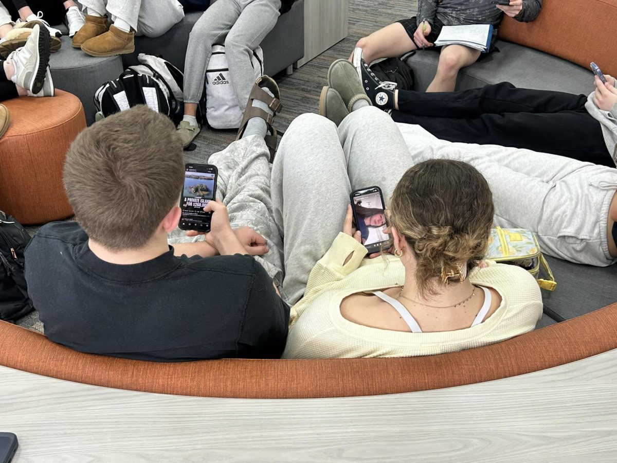 Students using phones.