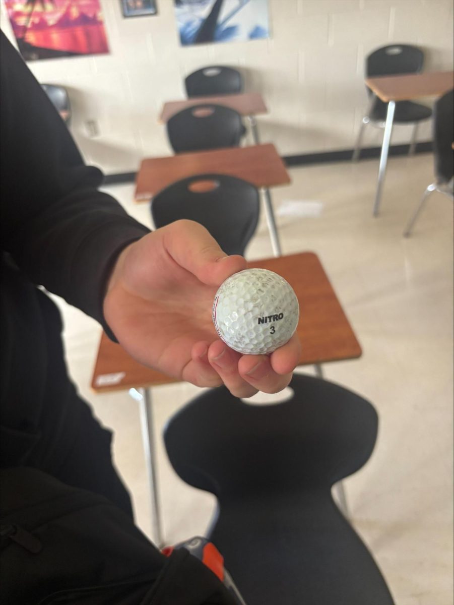 Golf ball found in backpack.